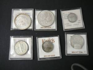 lot 143 image: 2- Morgan Silver Dollars 1918s Walking Liberty 1936 Columbia commemorative 1918 Standing Liberty Coin Toned 1942 Jefferson Proof