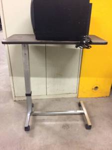lot 76 image: WOOD GRAIN OVERBED TABLE