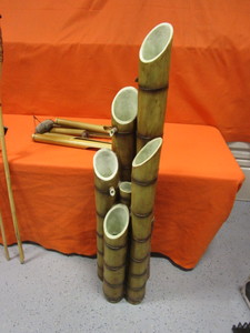 lot 83 image: Water Fountain, Wind Chime, Tiki Torches