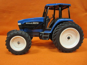 lot 99 image: 116th New Holland 8970 Tractor