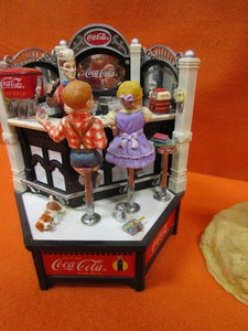 lot 121 image: Coca Cola Music Box & Figurines