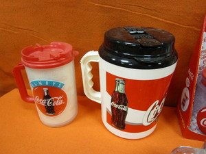 lot 122 image: Coca Cola Cups & Mugs