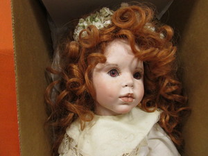 lot 129 image: Porcelain Doll 24 Tall
