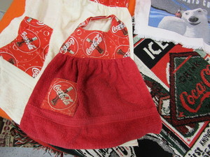 lot 164 image: Coca Cola Throw, Kids & Adult Apron, Towels, Placemats