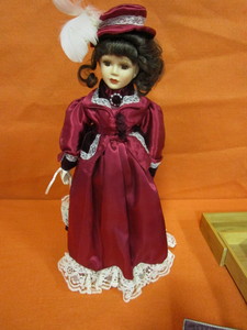 lot 399 image: Porcilain Doll, Wicker Basket, Wood Tray, Picture Frame