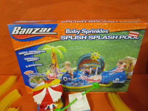 lot 404 image: (New) Baby Pool, Train Set