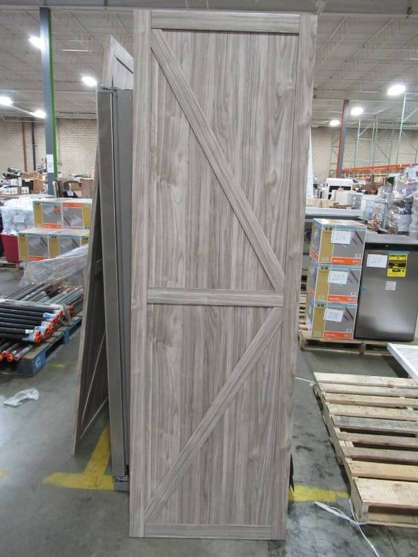 lot 264 image: Truporte 25 X 87 12 Iron Age Grey K Design Solid Core Interior Composite Barn Door Slab- Some Small Scratches.