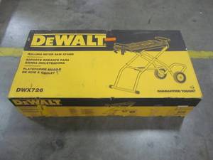 lot 69 image: DEWALT 32-12 in. x 60 in. Rolling Miter Saw Stand DWX726