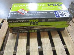 lot 134 image: (4 CASES) SMARTCORE Pro 8-piece 12-in x 24-in Ashland Gray Locking Vinyl Tile LX92605046