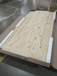 lot 313 image: Colonial Elegance 42 in. x 84 in. Station X-Brace Unfinished Knotty Pine Interior Barn Door Slab, RDSTA-42-ECOM