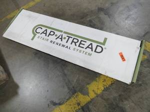 lot 296 image: Cap A Tread T2-1967 Aged Wood Fusion 47 in. Length x 12-18 in. Deep x 1-1116 in. Height Vinyl Overlay to Cover Stairs 1 in. Thick,