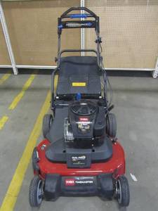 lot 152 image: Toro TimeMaster 30 in. Briggs & Stratton Personal Pace Self-Propelled Walk-Behind Gas Lawn Mower with Spin-Stop 21199
