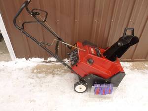 Toro snow thrower with electric start. Tested & works. As shown.
