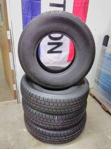 lot 133 image: Lot of (4) Rubbermaster RM77  ST23585R16 125121L Trailer Tires