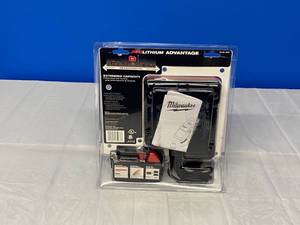 lot 3 image: MILWAUKEE M18 EVERYTHING FITS BATERY AND CHARGER
