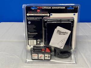 lot 5 image: MILWAUKEE M18 EVERYTHING FITS BATERY AND CHARGER