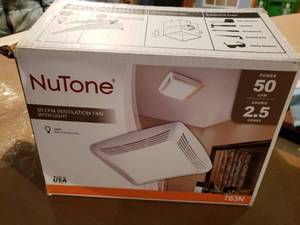 lot 14 image: NuTone Ventilation Fan with Light Open Box