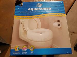 lot 26 image: AquaSense Raised Toilet Seat Used