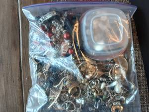lot 46 image: Bag Of Tangled Jewelry Mismatched Earrings & Misc.