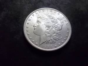 lot 13 image: 1884 Morgan Silver Dollar