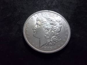 lot 16 image: 1885 O Morgan Silver Dollar