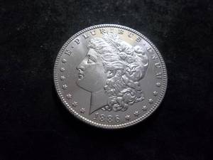 lot 17 image: 1886 Morgan Silver Dollar