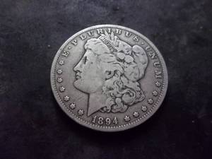 lot 28 image: 1894 O Morgan Silver Dollar