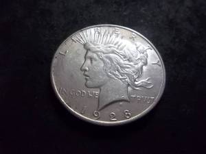 lot 54 image: 1928 S Silver Peace Dollar