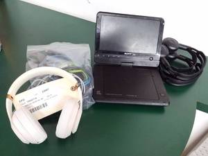 lot 8 image: Sony Portable CDDVD Player DP-FX96, Noise Cancelling Headphones, Car Chargers and Wall Chargers