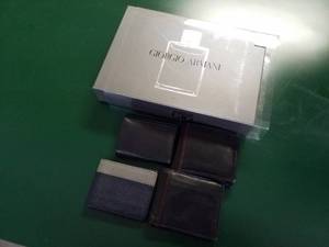 lot 19 image: Georgio Armani Aqua Di Gio 4-Piece Car Set, 4-Bifold Mens LeatherDenim Wallets