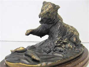 lot 48 image: Signed TERRELL OBRIEN Solid Bronze Grizzly Bear Catching Trout Sculpture