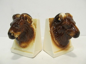 lot 248 image: Old Vintage Art Pottery Rams Head Bookends