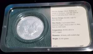 lot 06 image: 2002 AMERICAN SILVER EAGLE 1 TROY OZ. .999 FINE SILVER DOLLAR