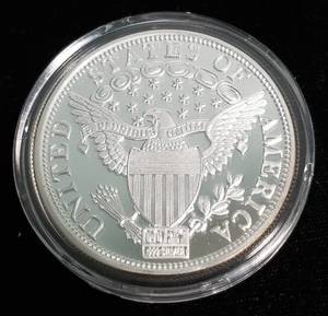 lot 16 image: 2 TROY OZ. .999 FINE SILVER 1804 DOLLAR DESIGN IN AIRTITE