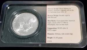 lot 27 image: 2001 AMERICAN SILVER EAGLE 1 TROY OZ. .999 FINE SILVER DOLLAR