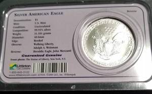 lot 33 image: 1991 AMERICAN SILVER EAGLE 1 TROY OZ. .999 FINE SILVER DOLLAR