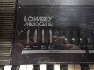 lot 140 image: Lowrie Micro Genie Electric Keyboard