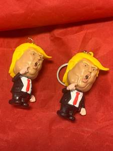 lot 10 image: Lot of 2 Donald Trump Light Up Noise Making Keychains