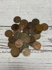 lot 74 image: Lof of 34 Indian Head Pennies