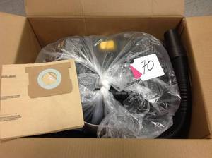 lot 70 image: DEWALT 4 Gal. Poly WetDry Vac  in good condition