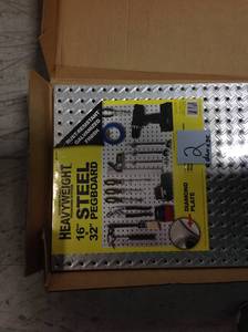 Knape & Vogt 16 in. x 32 in. Diamond Plate Galvanized Steel Pegboard SEE PHOTO SMALL BENT DAMAGE