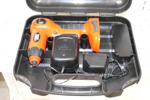 lot 61 image: Black and Decker 12 volt Drill XD1200 in case