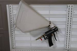 lot 70 image: Mud Boss Texture Hopper and Gun