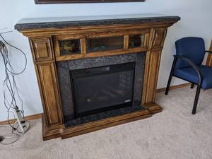 lot 10 image: Electric Fireplace with Remote and Granite Mantle