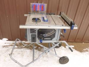 Kobalt 10 contractor saw with miter & fence. Used condition. Tested & works. As shown.