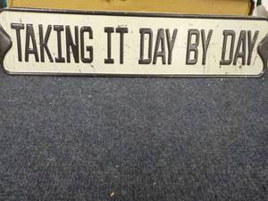 lot 12 image: Taking it Day by Day Metal Sign 19...