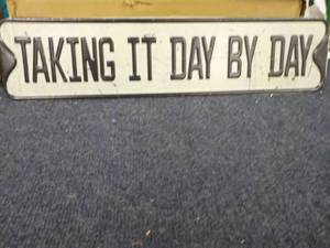lot 13 image: Taking it Day by Day Metal Sign 19...