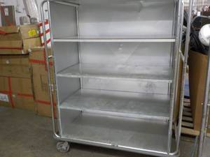 lot 32 image: Metal Storage Rack on Wheels 53 x ...