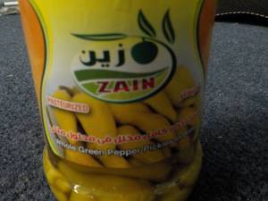 lot 233 image: 24 jars Zain Whole Green Peppers Pi...
