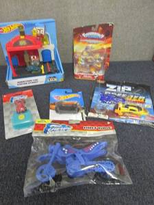 lot 188 image: Hot Wheels Items 7 Assorted Toys W3...